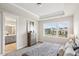 Main bedroom with ensuite bathroom and large windows at 605 Hyperion Aly, Wake Forest, NC 27587