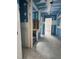 Hallway featuring a bathroom and contrasting blue paint at 67 Ridgeline Ct # 7, Pittsboro, NC 27312