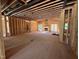New construction showing open concept living room with fireplace and access to backyard at 67 Ridgeline Ct # 7, Pittsboro, NC 27312