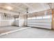 Spacious three car garage with unfinished drywall at 7417 Prato Ct, Wendell, NC 27591