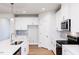 Bright kitchen with stainless steel appliances and a large center island at 7417 Prato Ct, Wendell, NC 27591