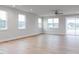 Open living room with luxury vinyl plank flooring and lots of natural light at 7417 Prato Ct, Wendell, NC 27591