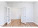 Bright home office space with beautiful hardwood flooring and glass french doors at 7417 Prato Ct, Wendell, NC 27591