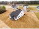 View of rear exterior of new construction home with a screened-in porch at 7417 Prato Ct, Wendell, NC 27591