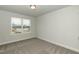 Bright, airy bedroom with a large window offering a lovely view at 225 Hopewell Branch Ct, Smithfield, NC 27577