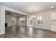 Bright, open-concept living and dining area with hardwood floors and ample natural light at 225 Hopewell Branch Ct, Smithfield, NC 27577