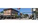 Charming street view with local flags displayed in a business district at 225 Hopewell Branch Ct, Smithfield, NC 27577