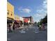 Community street view featuring businesses and residents enjoying local culture at 225 Hopewell Branch Ct, Smithfield, NC 27577