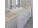Bathroom featuring a double sink vanity with modern fixtures at 2525 Silas Peak Ln, Apex, NC 27523