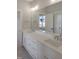 Elegant bathroom featuring a double vanity with modern fixtures at 2525 Silas Peak Ln, Apex, NC 27523