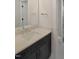 Modern bathroom features a sleek vanity with a white countertop and chrome fixtures at 2525 Silas Peak Ln, Apex, NC 27523