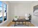 Bright office space with stylish trim accent wall, hardwood floors, and natural light at 2525 Silas Peak Ln, Apex, NC 27523