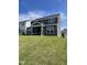Home exterior featuring a screened-in porch at 321 Murray Grey Ln, Wake Forest, NC 27587