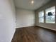A spacious bedroom featuring luxury vinyl plank flooring at 321 Murray Grey Ln, Wake Forest, NC 27587