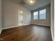 Bedroom boasts wood floors, recessed lighting, and an open doorway at 321 Murray Grey Ln, Wake Forest, NC 27587