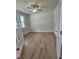 Spacious bedroom with carpet flooring, a ceiling fan, and natural light from a window at 104 Gin Branch Rd, Wendell, NC 27591