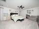 Spacious main bedroom featuring a ceiling fan, ensuite sitting area, and lots of natural light at 137 Shadowdale Ln, Rolesville, NC 27571