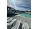 Community pool featuring lounge chairs and a covered area, perfect for relaxing and enjoying the sunny weather at 137 Shadowdale Ln, Rolesville, NC 27571