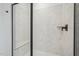 Shower with herringbone tile and built-in seat at 1429 Patchings Ln, Knightdale, NC 27545