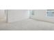 Bright bedroom with neutral carpeting and large windows at 1429 Patchings Ln, Knightdale, NC 27545
