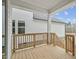 Wooden deck with railing, offering backyard access and views at 1429 Patchings Ln, Knightdale, NC 27545