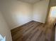 Compact bedroom with wood flooring and white walls at 29 Longdale Dr, Graham, NC 27253