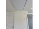 Attic access point on the ceiling with access door and light fixture at 135 Green Haven Blvd # 1, Youngsville, NC 27596