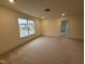 Well-lit bedroom featuring neutral walls, carpeting, and large window at 135 Green Haven Blvd # 1, Youngsville, NC 27596
