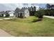 View of a two-story home with a large, green lawn at 135 Green Haven Blvd # 1, Youngsville, NC 27596
