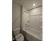 Functional bathroom featuring a shower-tub combination, toilet, and neutral color palette at 145 Green Haven Blvd # 83, Youngsville, NC 27596