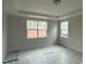 This neutral bedroom has tray ceiling and plenty of natural light at 145 Green Haven Blvd # 83, Youngsville, NC 27596