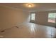 A bright bedroom with neutral walls, white trim and large windows at 145 Green Haven Blvd # 83, Youngsville, NC 27596