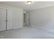 Spacious bedroom with neutral tones, carpet flooring, and closet at 145 Green Haven Blvd # 83, Youngsville, NC 27596