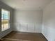 This dining room has chair railing, neutral paint and a bright window at 145 Green Haven Blvd # 83, Youngsville, NC 27596