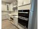 Modern kitchen boasts custom cabinets, stainless steel appliances, and sleek countertops at 145 Green Haven Blvd # 83, Youngsville, NC 27596