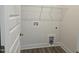 A functional laundry room featuring connections and ample storage space at 145 Green Haven Blvd # 83, Youngsville, NC 27596