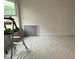 A room in progress with a ladder and painted gray square at 145 Green Haven Blvd # 83, Youngsville, NC 27596