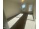 Spacious bedroom with two windows and neutral carpet at 508 Glenwyck Ct, Fuquay Varina, NC 27526