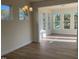 Spacious dining room with hardwood floors and sunroom access at 508 Glenwyck Ct, Fuquay Varina, NC 27526