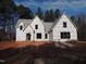 Two-story house under construction, brick exterior, covered porch at 1207 Red Cedar Court, Youngsville, NC 27596