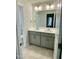 Double vanity bathroom with modern fixtures at 339 Bishop Ln, Sanford, NC 27330