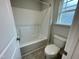 Clean bathroom with a tub and shower at 339 Bishop Ln, Sanford, NC 27330
