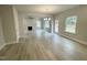 Open dining area with LVP flooring and access to the kitchen at 339 Bishop Ln, Sanford, NC 27330
