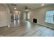 Open living area with LVP flooring and views to foyer at 339 Bishop Ln, Sanford, NC 27330