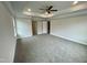 Main bedroom with carpet, ceiling fan and en-suite bathroom at 339 Bishop Ln, Sanford, NC 27330