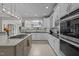 Bright, open kitchen with granite countertops and stainless steel appliances at 4600 Scottland Dr, Mebane, NC 27302
