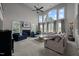 Inviting living room with a fireplace, tall windows, and comfortable seating arrangements at 4600 Scottland Dr, Mebane, NC 27302