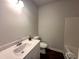 Bathroom featuring a shower, tub combo, toilet, and vanity at 215 Britt St, Smithfield, NC 27577