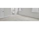 Bright bedroom leads to bathroom with a walk-in shower and double vanity sink at 1304 Jasmine View Way, Knightdale, NC 27545