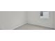 A carpeted bedroom features one window and ample closet space at 1304 Jasmine View Way, Knightdale, NC 27545